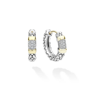 A pair of silver and yellow gold hoop earrings with pavé diamond accents, displayed on a clean white background with soft shadows.