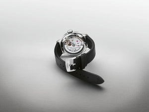 Watch with black strap and silver case on a light gray background