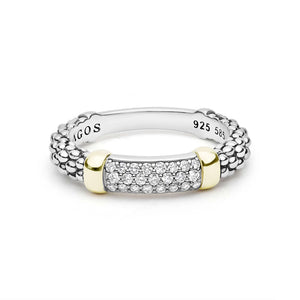 two tone diamond band ring on a white background