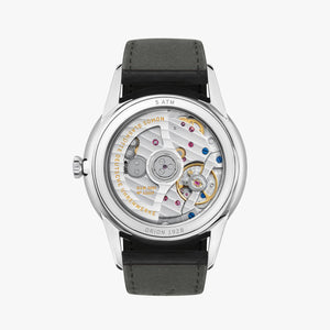 Watch with visible mechanical components on a white background
