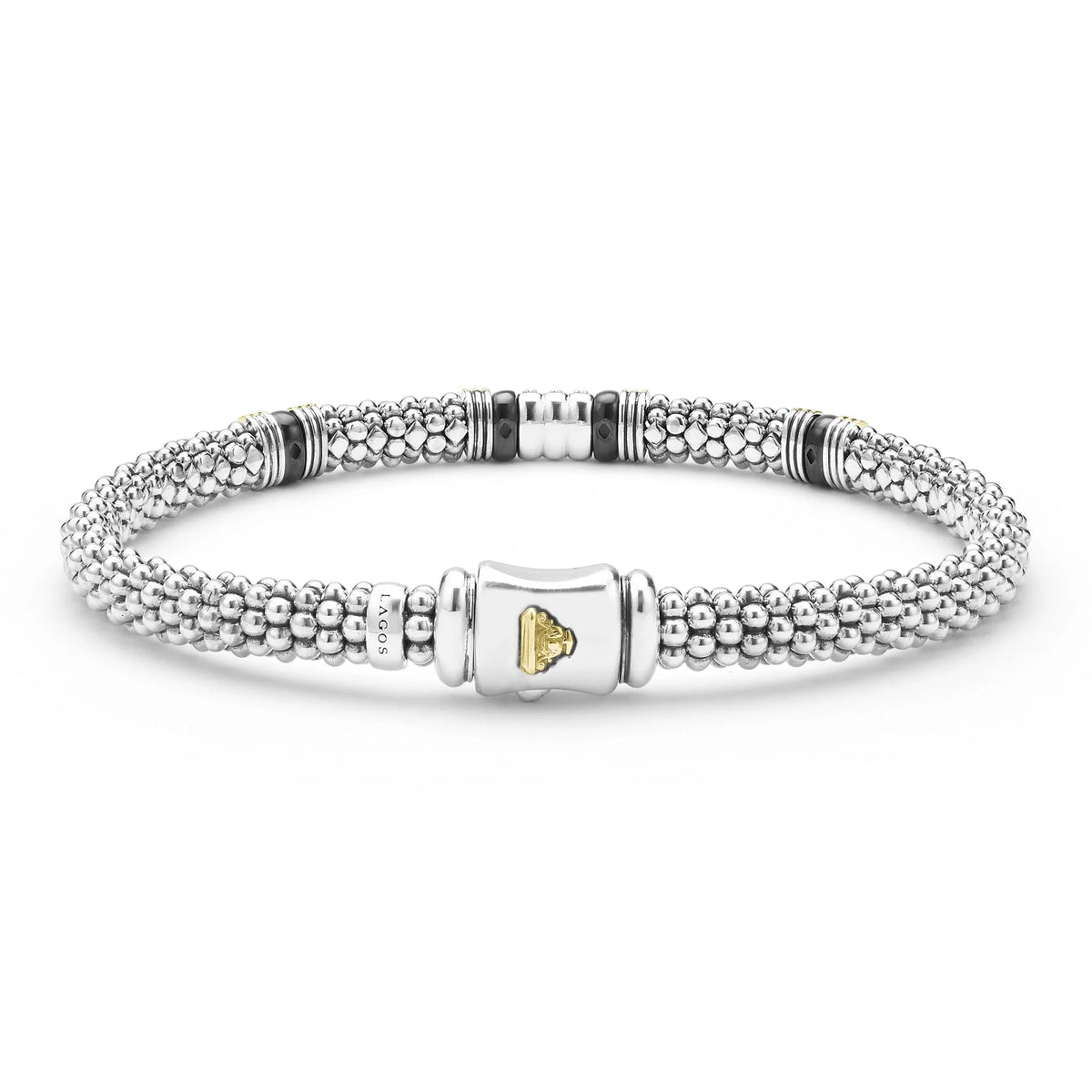 Front view of Two-Tone Black Ceramic Station Diamond Bracelet with 18K gold stations, diamond accents and Caviar beading on white