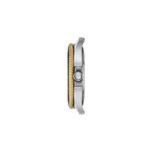 Side of watch, stainless steel and gold accent bezel with T on crown