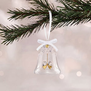 glass bell with crystals with gold tone finishes and plated tag with 2026 engraved with white ribbon hanging from a tree on a white shimmery background