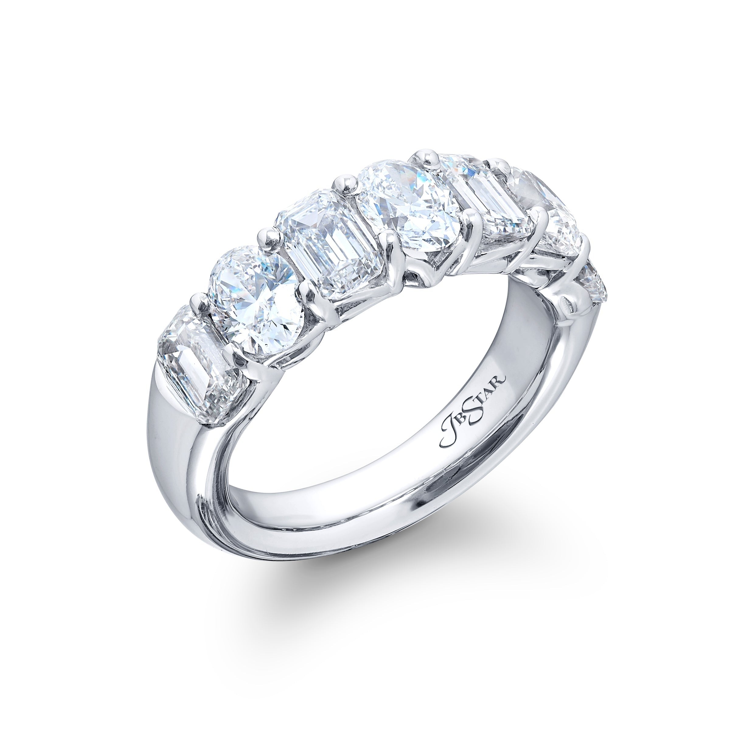 Angled close-up of 3.34ctw emerald and oval cut diamond band showing alternating emerald and oval cuts in platinum