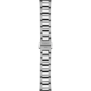 Silver bracelet with Tissot on clasp on white background