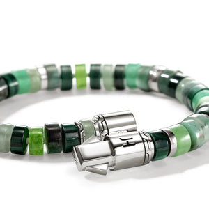 A beaded bracelet featuring translucent green and dark green cylindrical beads interspersed with polished silver-toned metal spacers and a matching silver clasp, shown on a clean white background.