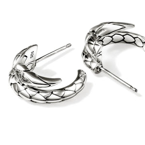 Pair of silver hoop earrings on a white background