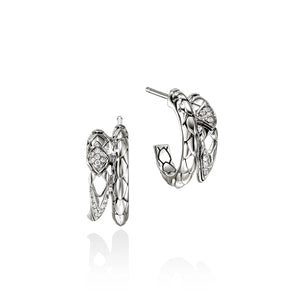 Pair of silver hoop earrings with heart-shaped designs on a white background