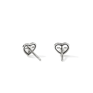 Silver heart-shaped earrings on a white background