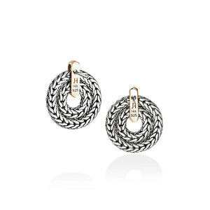 Pair of silver hoop earrings on a white background