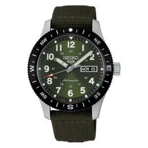 Seiko watch with green strap and dark green face on a white background
