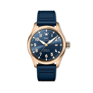 IWC watch with blue strap and blue dial with gold bezel on a white background