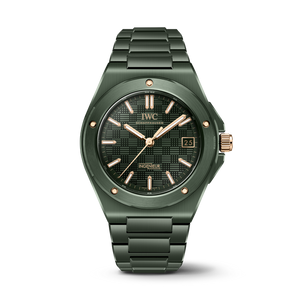 Green ceramic IWC watch with rose gold accents on a white background