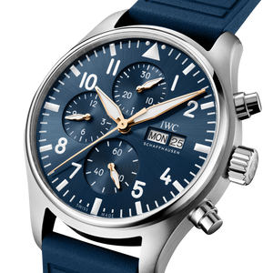 Wristwatch with blue strap and blue dial displaying brand name on a white background