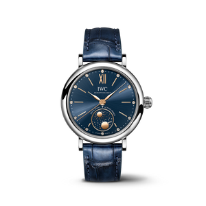 IWC watch with blue strap and blue dial on a white background