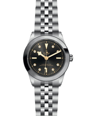 Front of TUDOR Black Bay 39mm steel watch showcasing anthracite dial with gold hands and diamond markers on steel bracelet