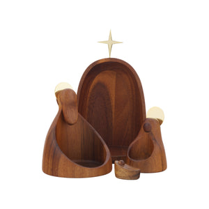 Wooden nesting nativity set with stylized Joseph, Mary and infant in a small cradle beneath a gold star.