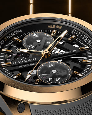 Luxury watch with gold and black design, featuring the brand 'Norqain'.