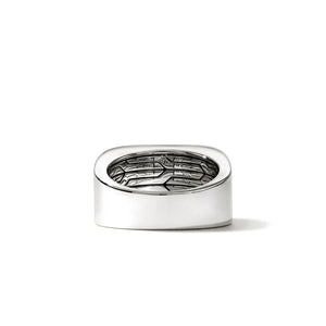 Silver ring with a textured design on a white background