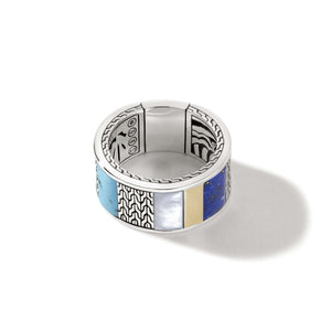 Top-down view of carved chain inlay band ring with turquoise, mother-of-pearl and lapis inlays and gold accents