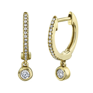Yellow gold huggie hoop earrings with pavé-set diamonds and dangling bezel-set round diamond charms