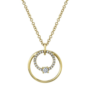 Gold necklace with two interlocking circles, inner pave diamond circle with central solitaire on a fine gold chain