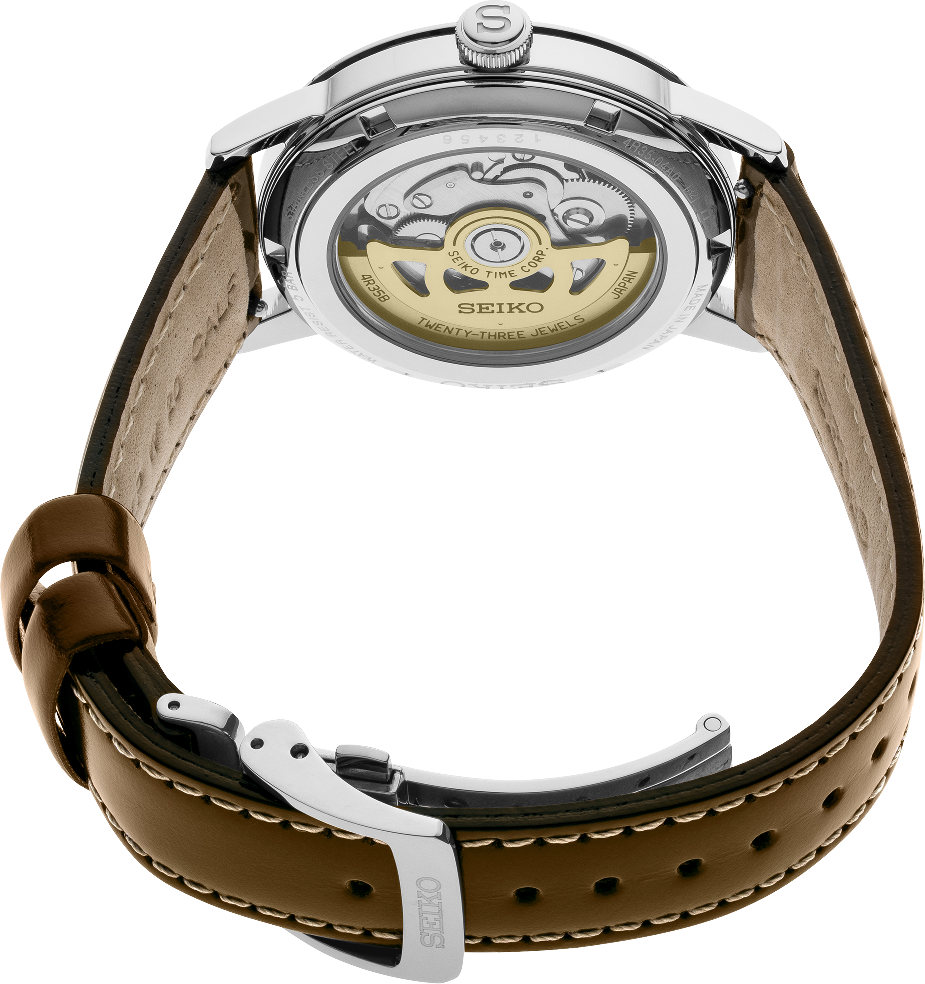 Rear view of Seiko SRPE45 showing exhibition caseback with gold rotor and brown leather strap on white background
