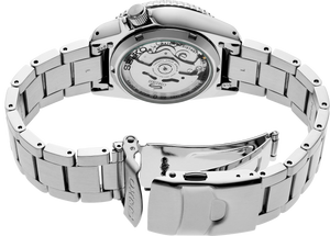Silver Seiko watch with open caseback on a white background