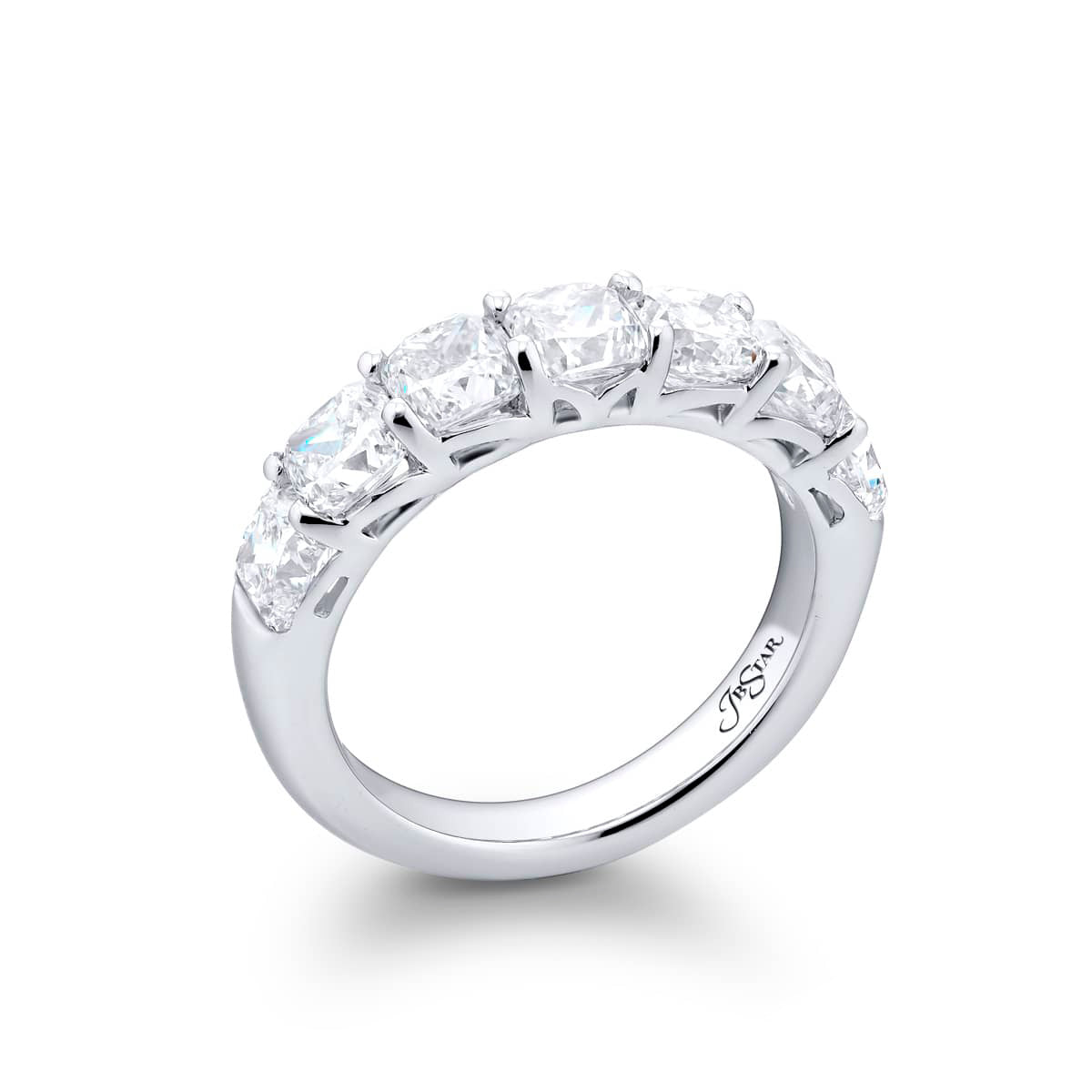 Three-quarter view of platinum band with seven prong-set cushion-cut diamonds (3.14 ctw) on white background
