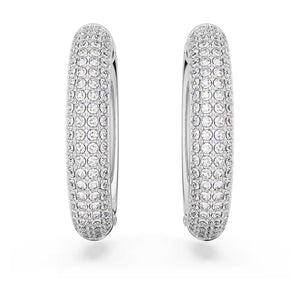 Front view of Dextera medium hoop earrings with pavé clear Swarovski crystals on rhodium finish, white background