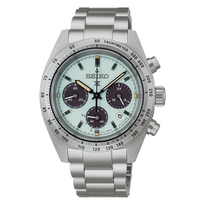 Stainless steel watch with a pale green dial on a white background