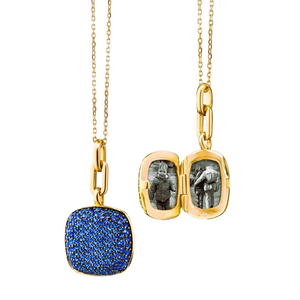 Gold chain with blue sapphires that hold two images