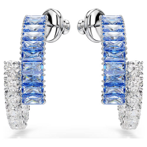 Front view of Matrix Hoop Earrings showing blue baguette Swarovski and clear round stones in silver on white background