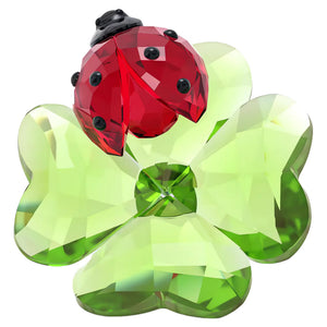 green crystal clover with red crystal lady bug on a white background