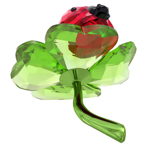 green crystal clover with red crystal lady bug on a white background