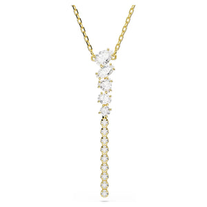 Gold tone Zirconia arranged in a gradient of sizes, this y-shape necklace on a white background