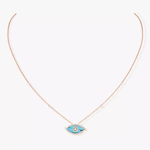Necklace with a blue evil eye pendant on a white background