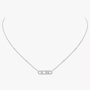 Silver necklace with a small pendant on a white background