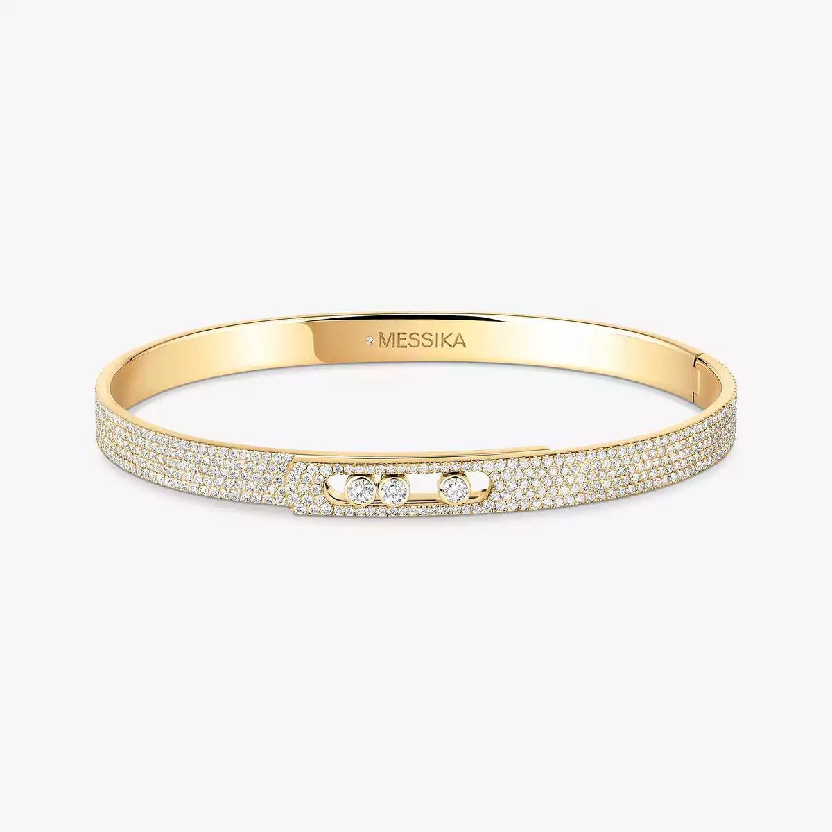 Gold bracelet with embedded stones on a white background, featuring the Messika brand.