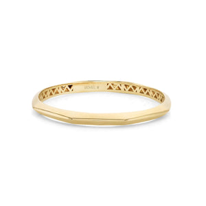 Front view of Octave 4mm bangle showcasing faceted octagonal edges and interior lattice cutouts, yellow gold on white background