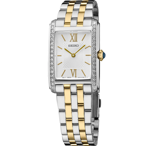 A Seiko women's two-tone watch with a silver and gold metal link bracelet, a white dial with gold Roman numerals, and a bezel accented with small clear crystals, shown on a plain white background.