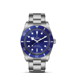 Front view of TUDOR Black Bay 54 watch showing blue domed dial, steel bezel, and stainless steel bracelet on white background