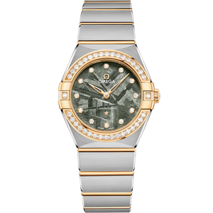 Front view of Omega Constellation 28 mm watch showcasing green meteorite dial and diamond bezel with two-tone steel and gold bracelet
