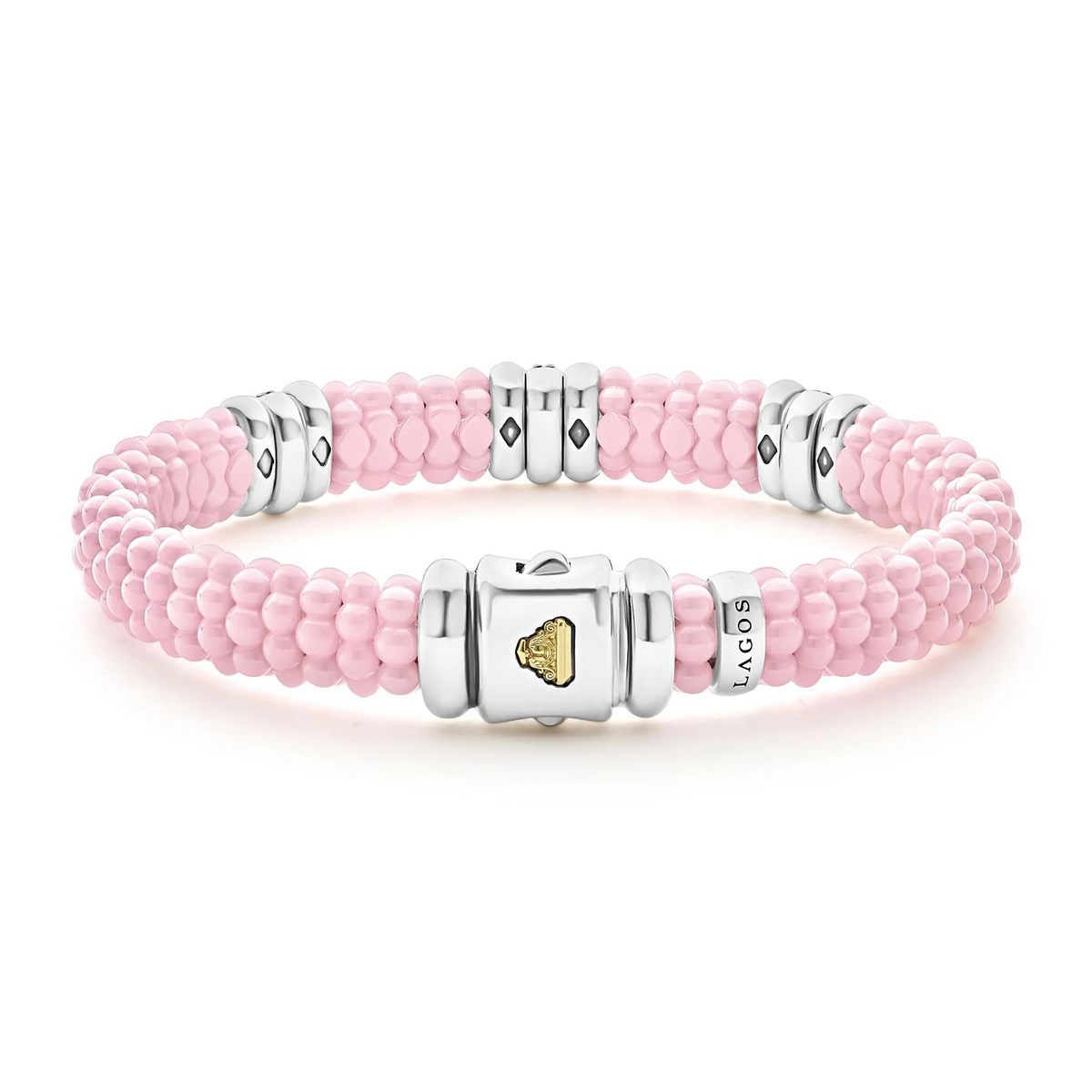 Close-up of pink three-station Diamond Caviar bracelet showing three sterling silver diamond stations (0.285 ctw) on white