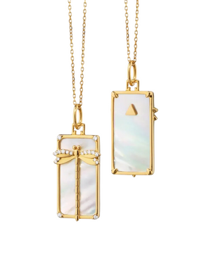 Yellow gold necklace with a dragon fly charm that has diamonds and mother of pearl on a white background
