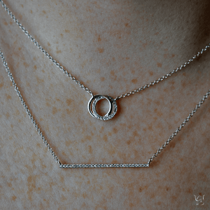 0.07ctw Diamond Love Knot Necklace - Gunderson's Jewelers