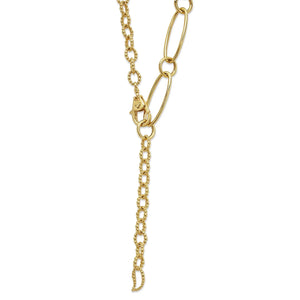 Close-up of 18k gold link necklace with oval and caviar beaded links, lobster clasp, dangling extender on white background