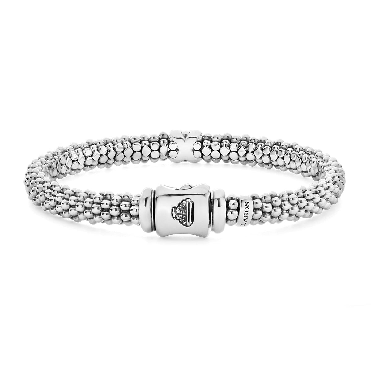 Single Station X sterling silver 6mm caviar beaded bracelet with diamond X station and barrel clasp on white background