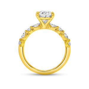Profile of 18K yellow gold 0.38ct engagement ring with prong-set center diamond and round diamonds on band, white background