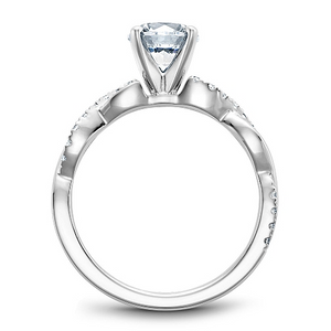 Triangular-cut center engagement ring with pavé-set side stones on a polished white-metal band